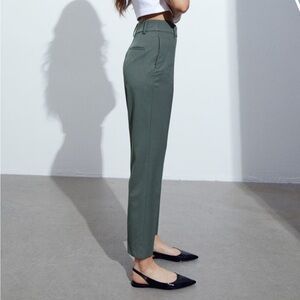 H&M dark green women’s slacks, size 8.